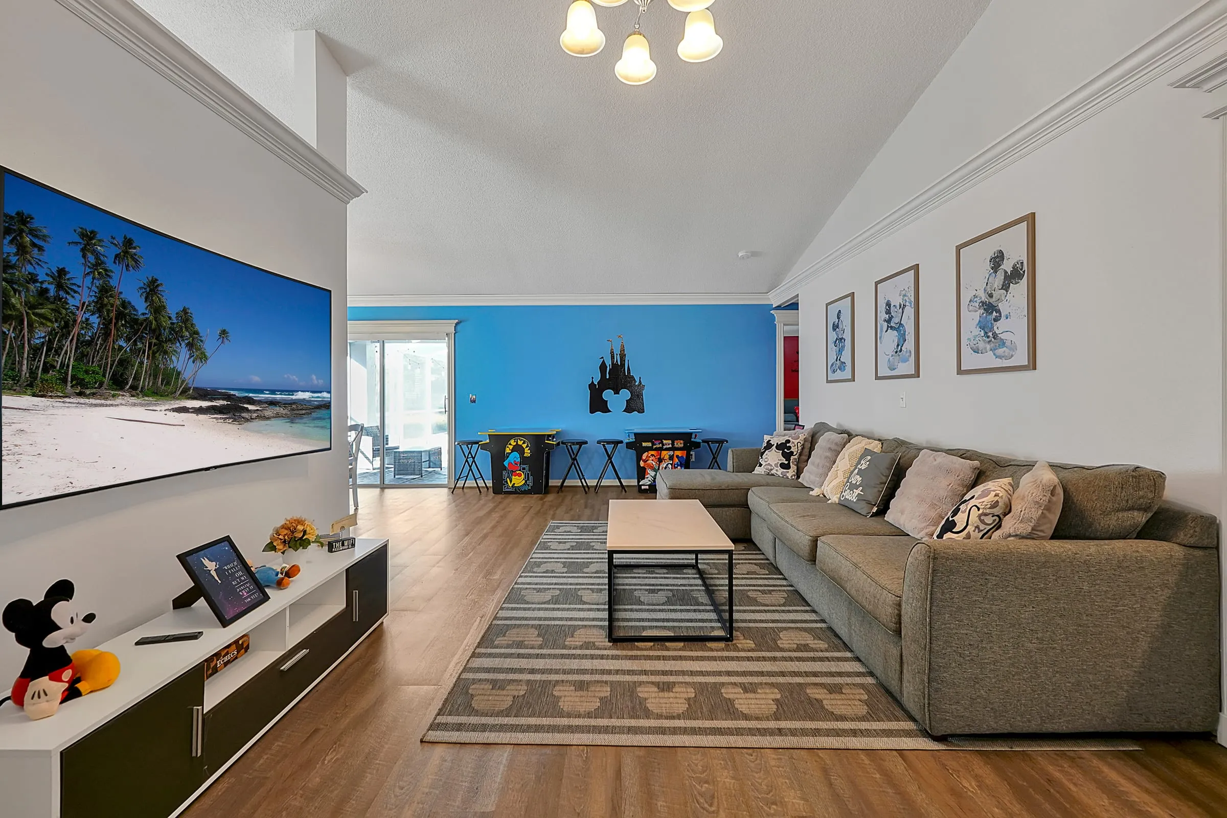 Sectional couch facing a themed accent wall