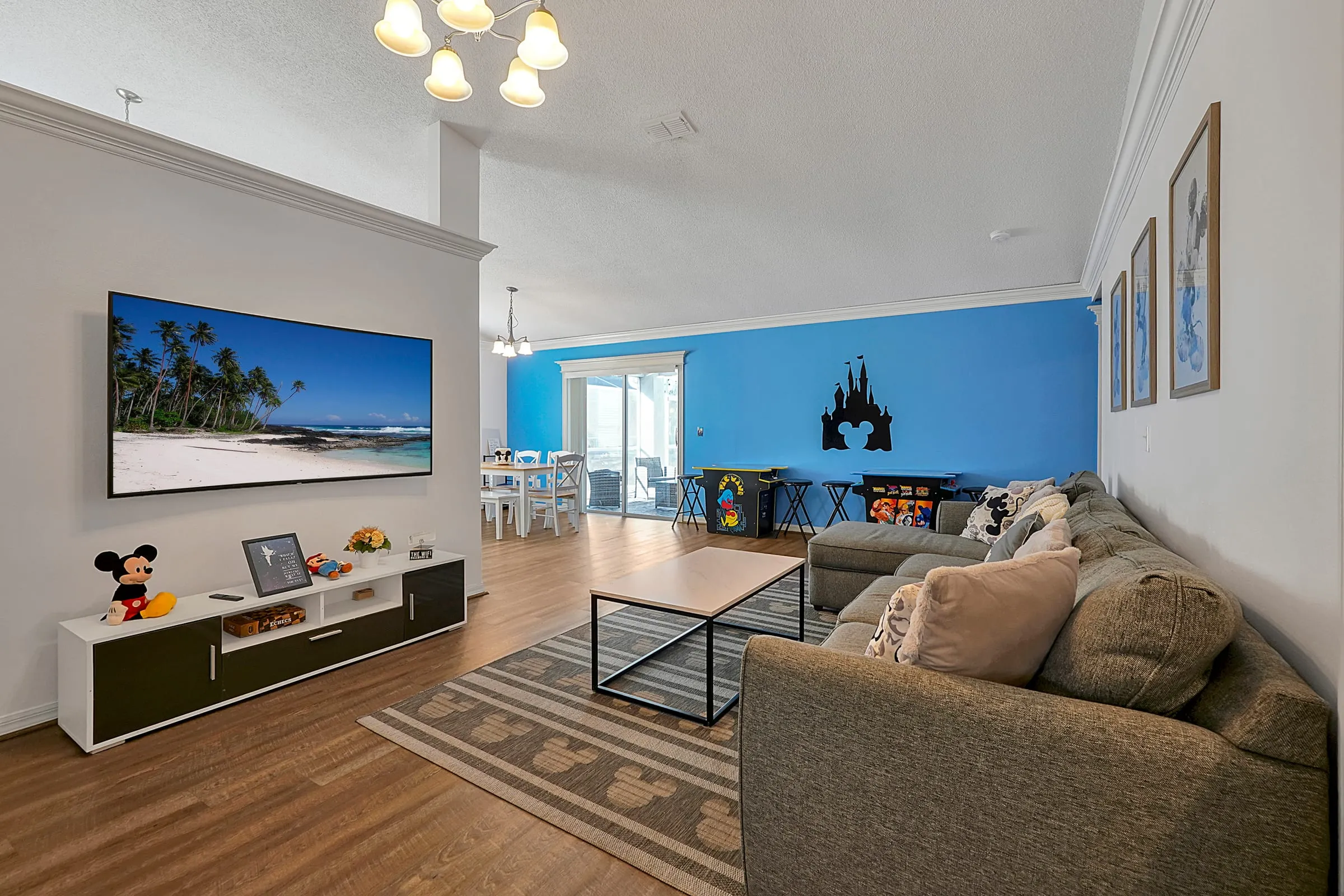 Sectional and smart TV from the dining-room angle