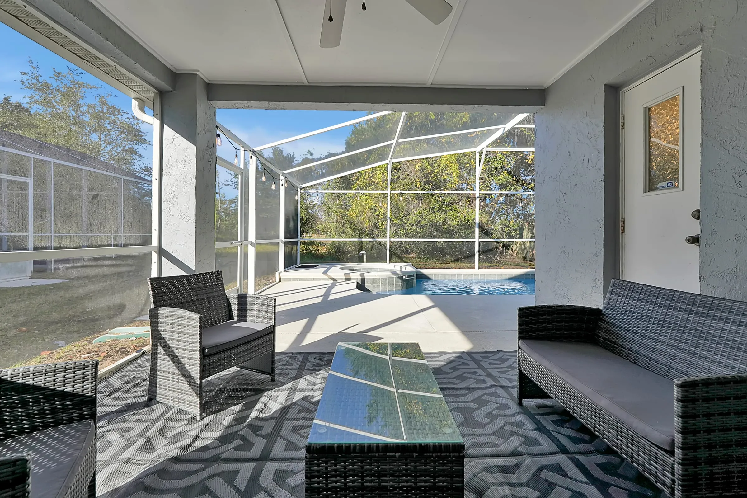 Covered lanai with lounge seating